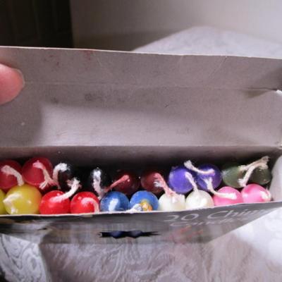 20 party candles, 1 votive candle with holder