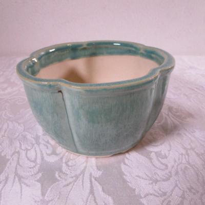 2 plastic plates, 1 planter, 1 Oneida silver-plated candy dish
