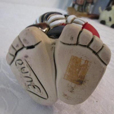 Launa clay painted hockey player