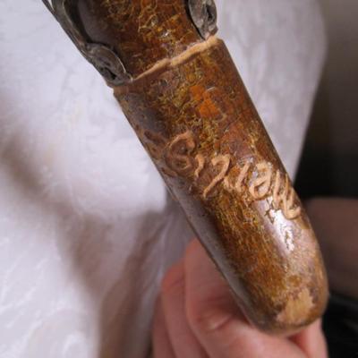 Wood cane with Swiss & German metal medallions