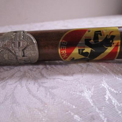 Wood cane with Swiss & German metal medallions