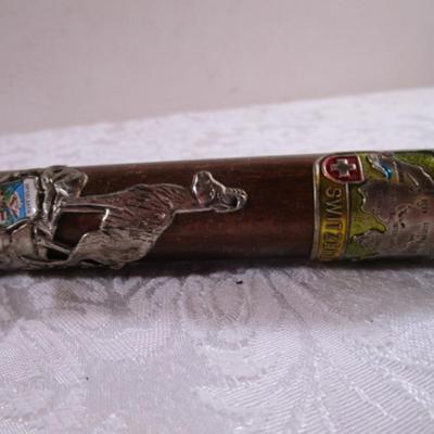 Wood cane with Swiss & German metal medallions