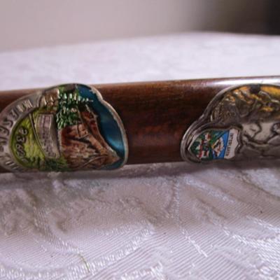 Wood cane with Swiss & German metal medallions