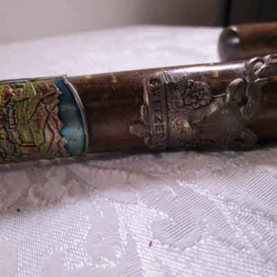 Wood cane with Swiss & German metal medallions