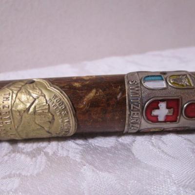 Wood cane with Swiss & German metal medallions