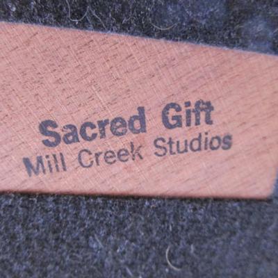 Sacred gift buffalo calf and lamb figurine
