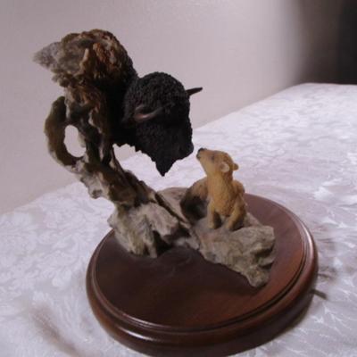 Sacred gift buffalo calf and lamb figurine