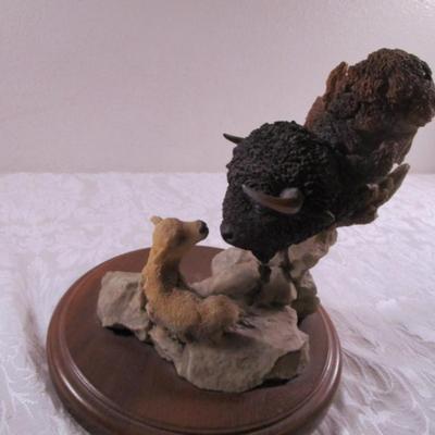 Sacred gift buffalo calf and lamb figurine