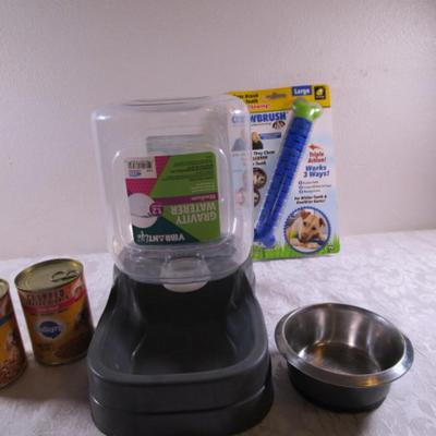 Gravity pet waterer, pet food dish, chewbrush, 2 cans dog food