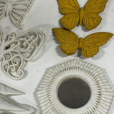 White resin decor and yellow butterflies
