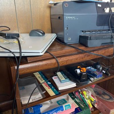 Sale Photo Thumbnail #73: Laptop, printer,CDs, and office supplies small office cabinet.

Shelves and CD holder not included.