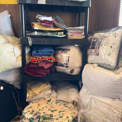 Sale Photo Thumbnail #77: Pillows, bedspread, sheets, cushions,placemats, table runners,

Shelves not included.