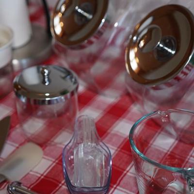 Kitchen Grouping of choice items. Front loading covered jars, 10 Utensils , Plus