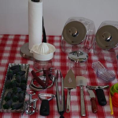 Kitchen Grouping of choice items. Front loading covered jars, 10 Utensils , Plus
