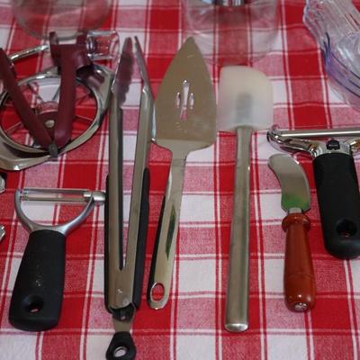 Kitchen Grouping of choice items. Front loading covered jars, 10 Utensils , Plus