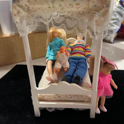 Doll Family and Canopy Bed