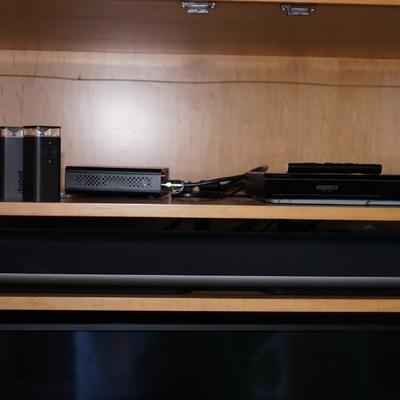 EXCELLENT CONTEMPORARY STYLE "HONEY " MAPLE COLORED ENTERTAINMENT CABINET W/BRUSHED CHROME HANDLES