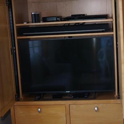 EXCELLENT CONTEMPORARY STYLE "HONEY " MAPLE COLORED ENTERTAINMENT CABINET W/BRUSHED CHROME HANDLES