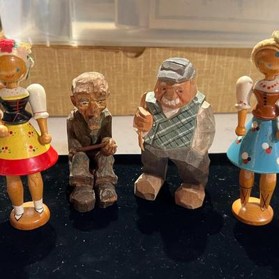 4 Wood Carved People
