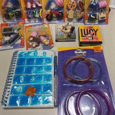 Erasers little books and pens
