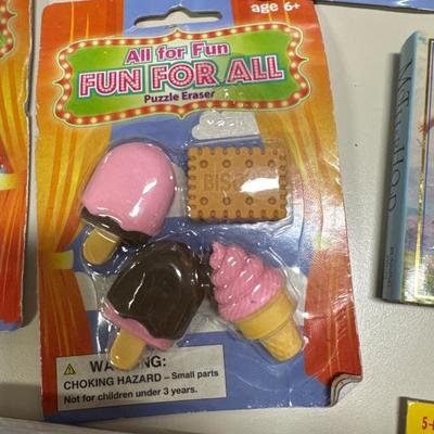 Erasers little books and pens