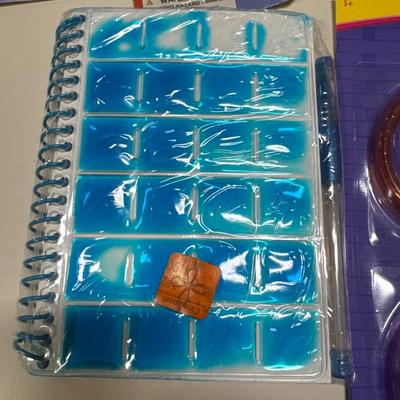 Erasers little books and pens