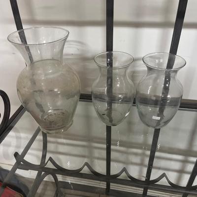 Bakers rack and vases