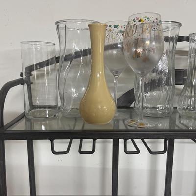 Bakers rack and vases