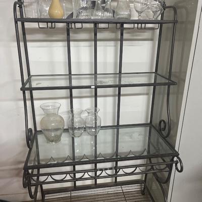 Bakers rack and vases