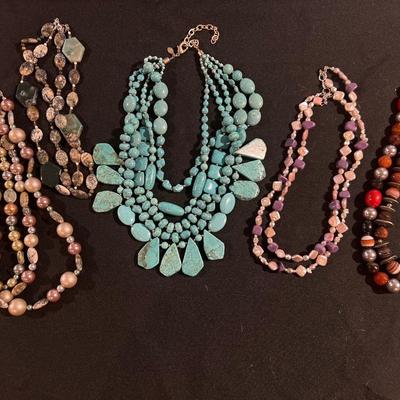 Five beaded necklaces