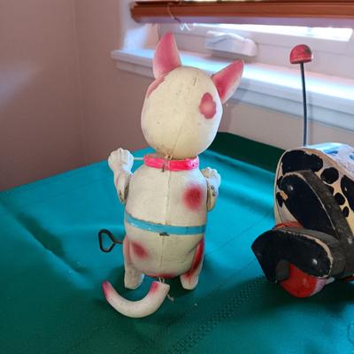 "SNOOPY" PULL TOY W/SOUND AND A BULL DOG WIND UP TOY