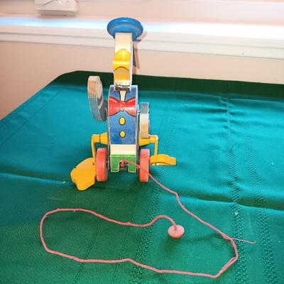 FISHER PRICE DONALD DUCK PULL TOY AND A JR JIGSAW PUZZLE
