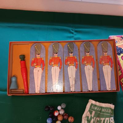 SOLDIERS ON PARADE AND SOME VERY OLD MARBLES