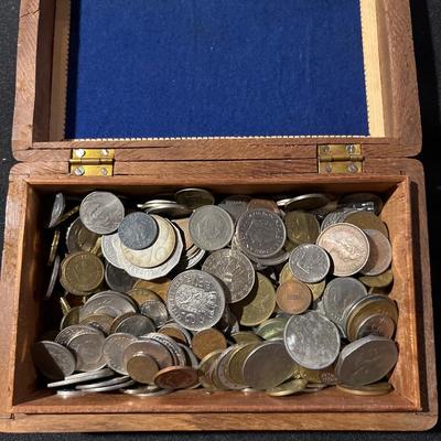 Wood box of coins