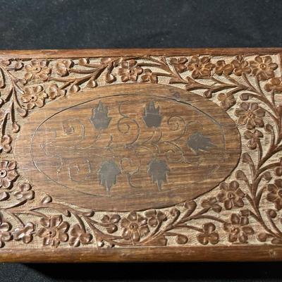 Wood box of coins