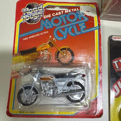 Coin separator, Hot Wheels, key chains, toy motorcycle and toy skateboards