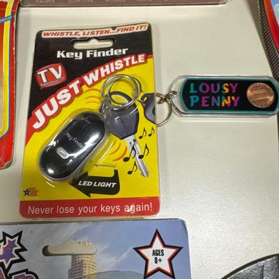 Coin separator, Hot Wheels, key chains, toy motorcycle and toy skateboards
