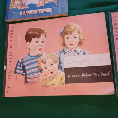 CHILDREN'S WORKBOOKS, SHEETS OF WRITING PAPER AND A BOOK