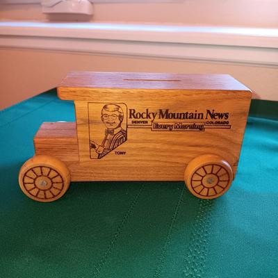 ROCKY MOUNTAIN NEWS WOODEN COIN BANK, PLASTIC BOAT AND NIB CUB SCOUT PINEWOOD DERBY KIT