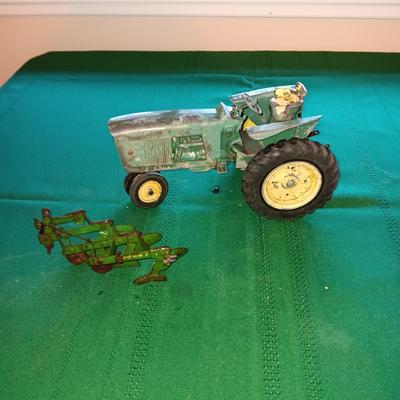 JOHN DEERE TOY TRACTOR AND IMPLEMENT