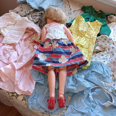 BABY DOLL WITH MANY CLOTHES
