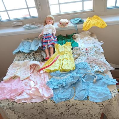 BABY DOLL WITH MANY CLOTHES