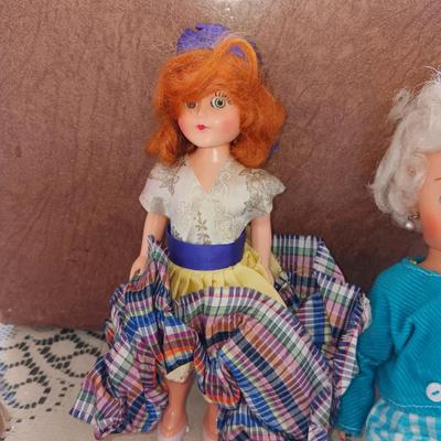 SMALLER DOLLS WITH A CARRY CASE