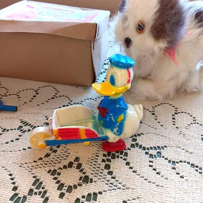 VINTAGE WIND UP JUMPING DOG AND DONALD DUCK TOY