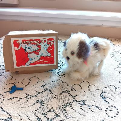 VINTAGE WIND UP JUMPING DOG AND DONALD DUCK TOY
