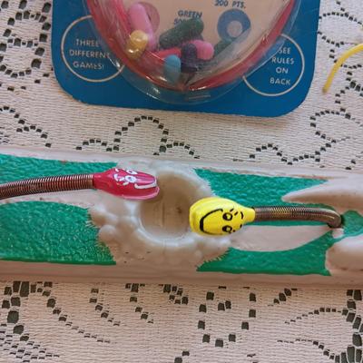 1961 "BEAT THE BEENS", MR POTATO HEAD TYPE TOY AND 2 FACES ON SPRINGS??