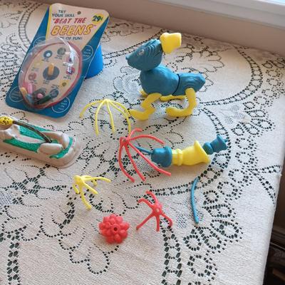 1961 "BEAT THE BEENS", MR POTATO HEAD TYPE TOY AND 2 FACES ON SPRINGS??