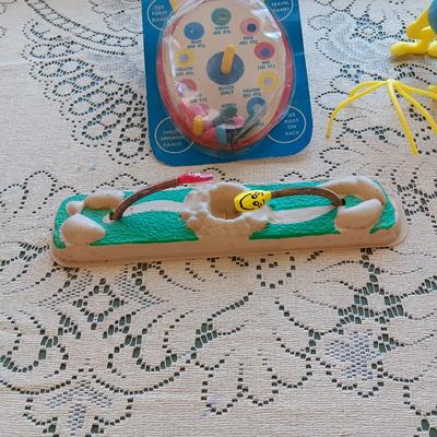 1961 "BEAT THE BEENS", MR POTATO HEAD TYPE TOY AND 2 FACES ON SPRINGS??