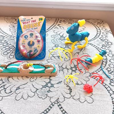 1961 "BEAT THE BEENS", MR POTATO HEAD TYPE TOY AND 2 FACES ON SPRINGS??