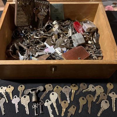 Wood box full of keys and locks